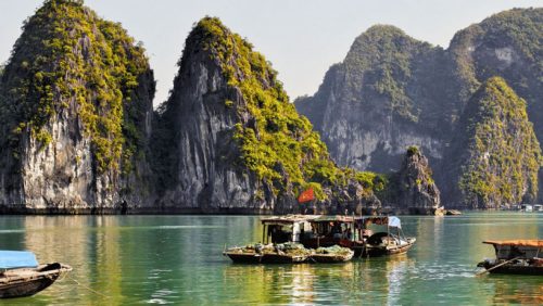 Unforgettable Trips Asia boats and mountainous islands